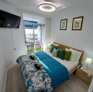 Ein Bett oder Betten in einem Zimmer der Unterkunft Ocean View Penthouse