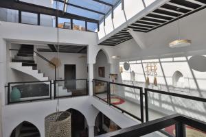a staircase in a house with a view at Riad Modern Bed & Breakfast in Marrakech
