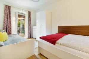 Postel nebo postele na pokoji v ubytování Alpinum Residence Lungau Apartments