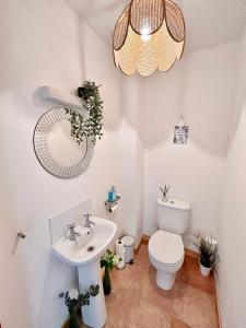 a bathroom with a toilet and a sink at Homestead House, Fort Augustus in Fort Augustus +24 photos