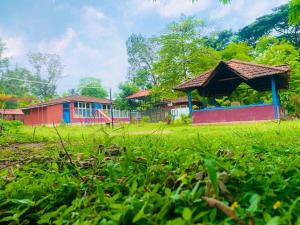Zahrada ubytování Coorg Nest Cottages By Dreamy Vacations