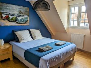 Un pat sau paturi într-o cameră la Le Rondot - Maison de campagne proche Mont-Saint-Michel 12km