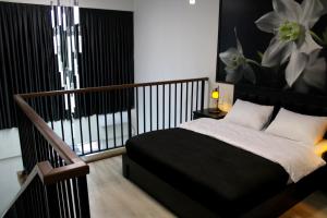 Postel nebo postele na pokoji v ubytování Royal Stay + 73 fotografií