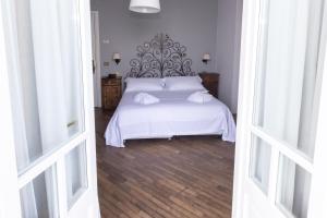 Postel nebo postele na pokoji v ubytování Albergo Ristorante Il Verbano