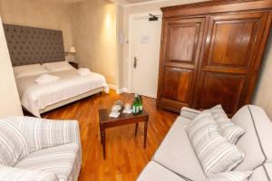 Postel nebo postele na pokoji v ubytování Albergo Ristorante Il Verbano