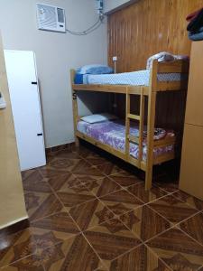 Ein Bett oder Betten in einem Zimmer der Unterkunft Hostel el Amanecer