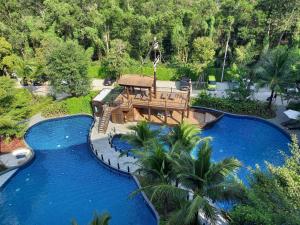 an aerial view of a resort with a blue pool at А2 ВАТСАП669З582I976 примем РУБЛИ in Nai Yang Beach
