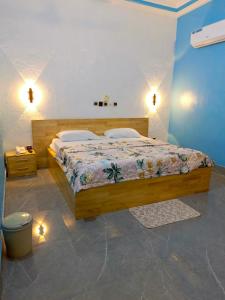 Postel nebo postele na pokoji v ubytování HOTEL MAVILLA Cotonou