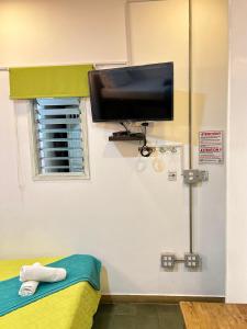 Un televizor și/sau centru de divertisment la Hotel Boutique Stay La 10
