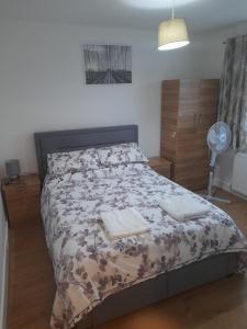 Postel nebo postele na pokoji v ubytování London Luxurious Sweet Home + 4 fotografie