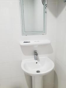 Ένα μπάνιο στο Al Reef Hotel Suits