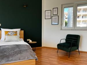 Postel nebo postele na pokoji v ubytování Kavajin Rooms