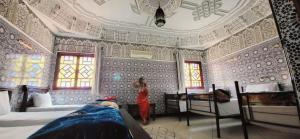 Postel nebo postele na pokoji v ubytování Riad Marrakech Medina