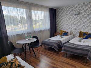 Postel nebo postele na pokoji v ubytování Noclegi Bytom - OPAL