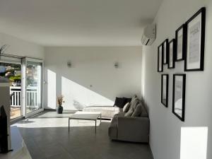 Posezení v ubytování Kavajin Rooms
