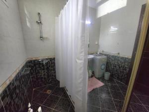 Koupelna v ubytování Pink Diamond studio apartment