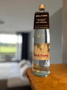 a bottle of black forest vodka sitting on a table at KELLER APARTMENT I 106 Kniebis in Freudenstadt
