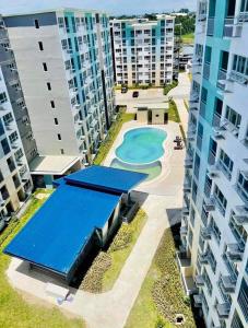 an overhead view of a pool in the middle of buildings at SEAWIND TOWER 6 CONDOMINIUM in Davao City