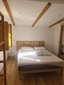 Posteľ alebo postele v izbe v ubytovaní Le Dune di Circe