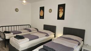 Ein Bett oder Betten in einem Zimmer der Unterkunft APARTMENTS KREMSTAL