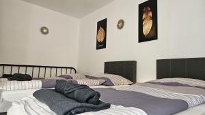Ein Bett oder Betten in einem Zimmer der Unterkunft APARTMENTS KREMSTAL