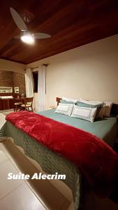 En eller flere senge i et værelse på POUSADA E RESTAURANTE CASA PRIMITIVUS