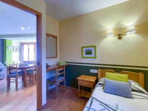 Postel nebo postele na pokoji v ubytování Apartaments La Bonaigua