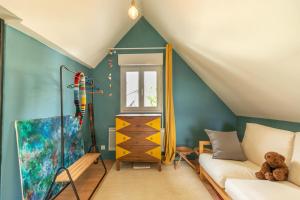 Postel nebo postele na pokoji v ubytování Chez Miriam - Maison de caractère - Ville avec jardin