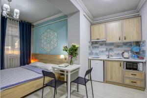 Kuchyň nebo kuchyňský kout v ubytování Viva Hotel