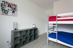 En eller flere senge i et værelse på Big House 2 minutes from Disneyland Paris