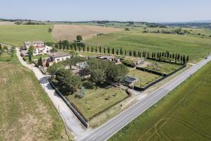 an aerial view of a house and a road at Anilde, house with private pool, Colle di Val d'Elsa, Toscana in Colle di Val d'Elsa