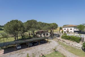 an aerial view of a farm with a building at Anilde, house with private pool, Colle di Val d'Elsa, Toscana in Colle di Val d'Elsa