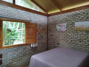 Postel nebo postele na pokoji v ubytování Sitio com jaccuzi, fogão a lenha
