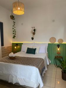 Postel nebo postele na pokoji v ubytování Pousada Villa Real Paraty - Localização e café da manhã EXCELENTES"