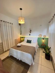 Postel nebo postele na pokoji v ubytování Pousada Villa Real Paraty - Localização e café da manhã EXCELENTES" + 37 fotografií