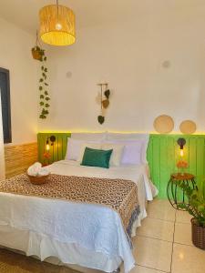 Postel nebo postele na pokoji v ubytování Pousada Villa Real Paraty - Localização e café da manhã EXCELENTES"