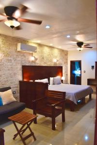 Postel nebo postele na pokoji v ubytování El Zaguán Colonial by GuruHotel