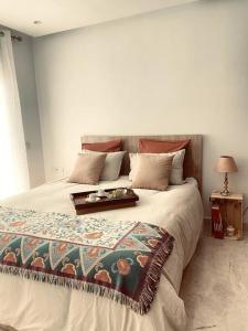 Ліжко або ліжка в номері Appartement Luxe - Casablanca