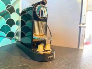 a small radio sitting on top of a table at *Le Royal*Havre De Paix*Wifi* in Marseille