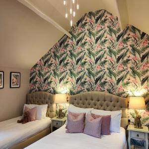 Ліжко або ліжка в номері The Corner House