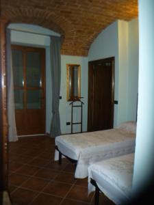 Posteľ alebo postele v izbe v ubytovaní Casa Tavasso