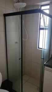 Ett badrum på Apartamento aconchegante em Candeias