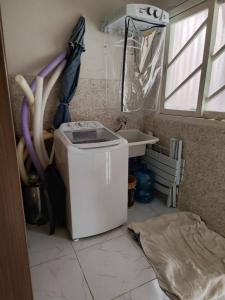 Ένα ή περισσότερα κρεβάτια σε δωμάτιο στο Casa com Piscina