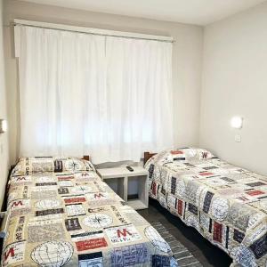 Ένα ή περισσότερα κρεβάτια σε δωμάτιο στο Hotel Miceli
