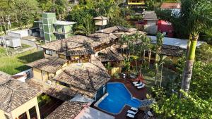 A piscina localizada em Pousada Villa Nina ou nos arredores