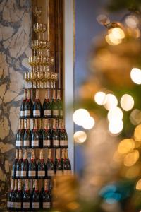 a group of wine bottles on a wall at Fairmont San Francisco in San Francisco