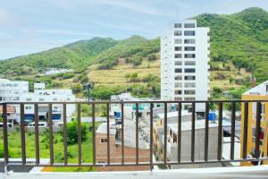 a view of a city from a balcony at Penthouse Rodadero Norte in Gaira