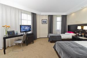 Posteľ alebo postele v izbe v ubytovaní Hotel Fado Spa & Restaurant
