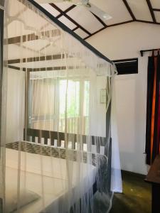 Koupelna v ubytování Ganesh Garden Beach Cabanas