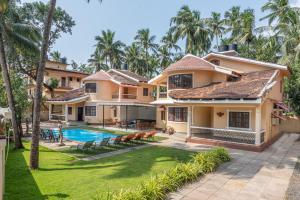 an image of a villa with a swimming pool at Villa Calangute Phase 3 in Calangute